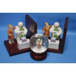TWO COALPORT '"THE SNOWMAN'" LEFT HAND BOOKENDS TOGETHER WITH A COALPORT SNOWMAN SNOW GLOBE