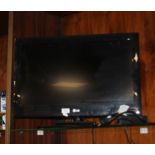 A 26'" LG TV AND REMOTE H/C