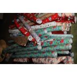 A QUANTITY OF ROLLS OF GIFT WRAP