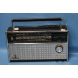 A 1970S GRUNDIG YACHT-BOY 210 LW/MW/SW/FM TRANSISTOR RADIO