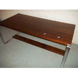 A ROSEWOOD COFFEE TABLE