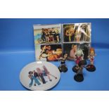 A COLLECTION OF SPICE GIRLS MEMORABILIA TO INCLUDE PHOTOGRAPHS, A PLATE AND FOUR FIGURES