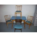 A RETRO KITCHEN TABLE AND THREE CHAIRS PLUS AN EXTRA CHAIR