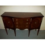 A SERPENTINE FRONTED MAHOGANY SIDEBOARD