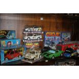 A COLLECTION OF BOXED EMERGENCY VEHICLES INCLUDING POLICE, FIRE ENGINE ETC.