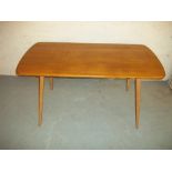 AN ERCOL DINING TABLE