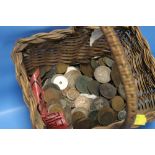 A BASKET OF OLD COINS