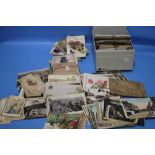 A TWO BOXES OF ASSORTED POSTCARDS INCLUDING WW1 ERA