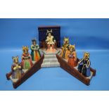 A BOXED ROYAL DOULTON '"BUNNYKINS'" HENRY VII AND HIS SIX WIVES WITH STAND