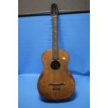 AN ACOUSTIC GUITAR, NO MAKER'S NAMECondition Report:WELL WORN