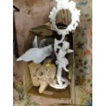 A CAST GARDEN CHERUB FIGURE TOGETHER WITH A FAIRY AND MONKEY BIRD HOUSE