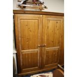 A MODERN DOUBLE HONEY PINE WARDROBE H-196 CM W-163 CM