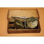 AN OAK CASED SET OF ANTIQUE SCALES & WEIGHTS