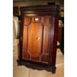 A REPRODUCTION MAHOGANY GLAZED HANGING CORNER CABINET