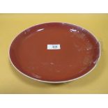 A CHINESE SANG DE BEOUF DISH' with six character mark to base' A/F' Dia 22.5 cmCondition Report: