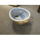 AN ANTIQUE BLUE AND WHITE BIDET BOWL? WITH CHERUBIC DETAIL A/F