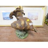 AN ANTIQUE CERAMIC FIGURE OF A GROUSE S/D