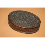 AN ANTIQUE CARVED WOODEN BOX SIGNED O. MOENE