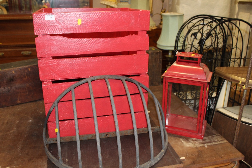 TWO RED CRATES TOGETHER WITH A RED LANTERN & A RACK