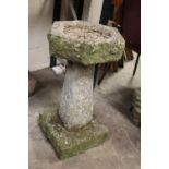 A RECONSTITUTED STONE BIRD BATH H-71 CM