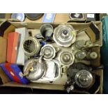 A TRAY OF SILVER PLATED METALWARE ETC. TO INCLUDE A FLUTED THREE PIECE TEA SERVICE' CRUET SET ETC.