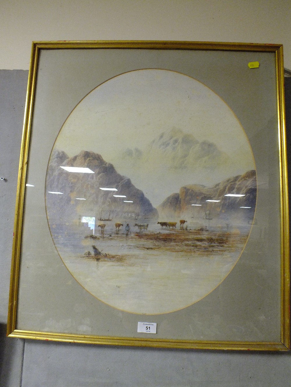 E.L. HERRING - A FRAMED AND GLAZED WATERCOLOUR DEPICTING A FIGURE WITH CATTLE IN A MOUNTAINOUS - Image 2 of 2