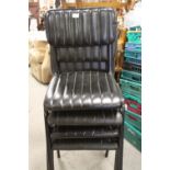 A SET OF FOUR MODERN UPHOLSTERED BLACK DINING CHAIRS