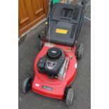 A SOVEREIGN PETROL LAWNMOWER