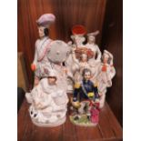 FIVE ASSORTED ANTIQUE STAFFORDSHIRE STYLE FLATBACK FIGURES