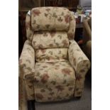 AN UPHOLSTERED MEMORY FOAM ELECTRIC RISE/RECLINE ARMCHAIR