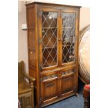 AN OAK OLD CHARM LEADED BOOKCASE H-184 CM W-100 CM