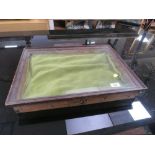 A GLAZED TABLETOP DISPLAY CASE