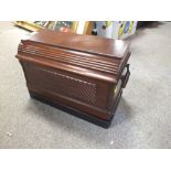 A VINTAGE MAHOGANY CASED SINGER SEWING MACHINE