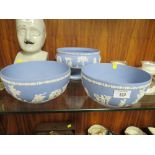 TWO LARGE WEDGWOOD JASPERWARE BOWLS TOGETHER WITH A LARGE JASPERWARE FOOTED BOWL
