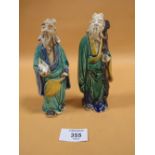 A PAIR OF ORIENTAL STYLE FIGURES STAMPED CHINA TO BASE