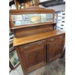 AN ANTIQUE MIRRORBACKED CHIFFONIER H - 181 CM W - 137 CM