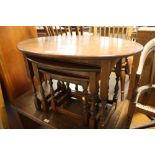 AN ,OLD CHARM, OAK OVAL NEST OF THREE TABLES H - 52 CM W - 82 CM (LARGEST)