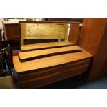 A RETRO MID CENTURY TEAK DRESSING TABLE W-128 CM AND A BEDSIDE CHEST (2)