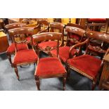 A SET OF SEVEN ANTIQUE MAHOGANY DINING CHAIRS RAISED ON FLUTED SUPPORTS (5+2)