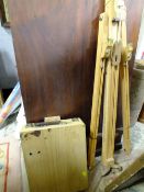 A WOODEN ARTISTS EASEL' TOGETHER WITH AN ARTISTS EASEL BOX (2)