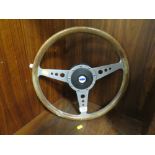 A VINTAGE FORD MOTO-LITA CAR STEERING WHEEL