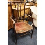 AN EDWARDIAN MAHOGANY ARMCHAIR