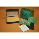 AN EMPTY ROLEX OYSTER WATCH BOX WITH CERTIFICATES