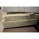 A MODERN SINGLE BED BASE AND MATTRESS