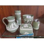 FIVE PIECES OF GREEN WEDGWOOD JASPERWARE TO INCLUDE A TABLE LIGHTER (5)