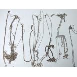 SELECTION OF 12 SILVER CHAINS TOGETHER WITH SIX SILVER BRACELETS