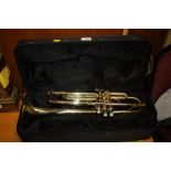 A CASED ELKHART TRUMPET (NO MOUTHPIECE)