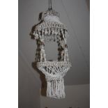 AN UNUSUAL TRIBAL STYLE HAND MADE SEA SHELL LIGHT SHADE