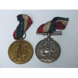 A PAIR OF WWI MEDALS TO J.ROBINSON M.G.C
