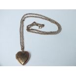 A LARGE 9CT GOLD BACK & FRONT LOCKET ON CHAIN